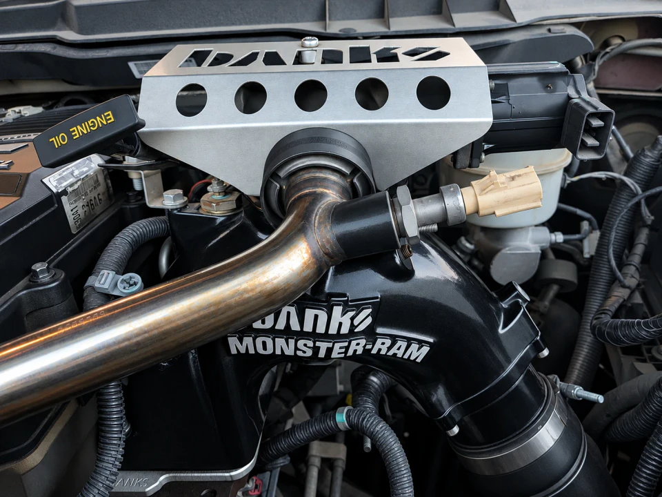 A Banks Monster-Ram intake elbow installed on a diesel engine